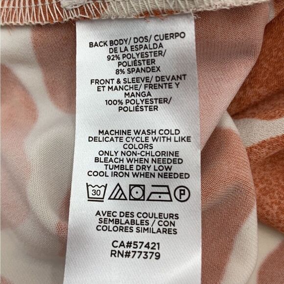 Ann Taylor Giraffe Print Mixed Media
Ruffle Neck Shell, size L - Picture 8 of 9